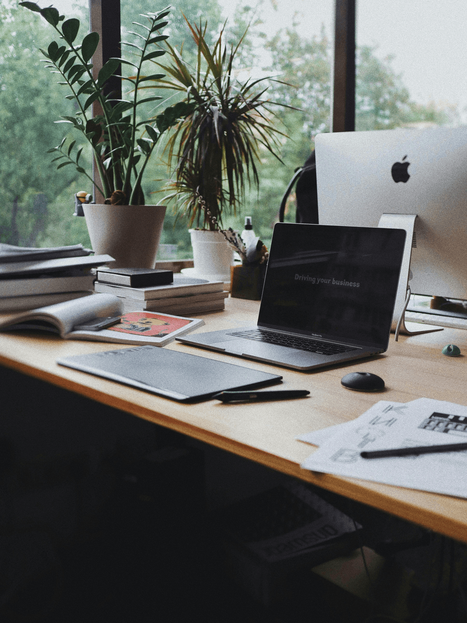 A picture of electronic devices standing on a desk